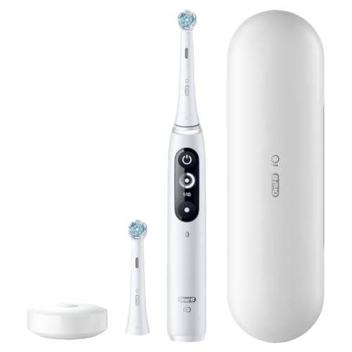 Oral-B iO Deep Clean + Protect Rechargeable Electric Toothbrush, White with Visible Pressure Sensor, 5 Cleaning Settings, 2 Min Timer, an iO Series 7 Toothbrush, 2 Replacement Brush Heads, and Charging Travel Case