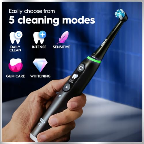 Oral-B iO Deep Clean + Protect Rechargeable Electric Toothbrush, White with Visible Pressure Sensor, 5 Cleaning Settings, 2 Min Timer, an iO Series 7 Toothbrush, 2 Replacement Brush Heads, and Charging Travel Case