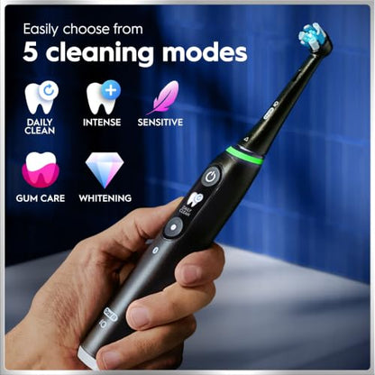 Oral-B iO Deep Clean + Protect Rechargeable Electric Toothbrush, White with Visible Pressure Sensor, 5 Cleaning Settings, 2 Min Timer, an iO Series 7 Toothbrush, 2 Replacement Brush Heads, and Charging Travel Case